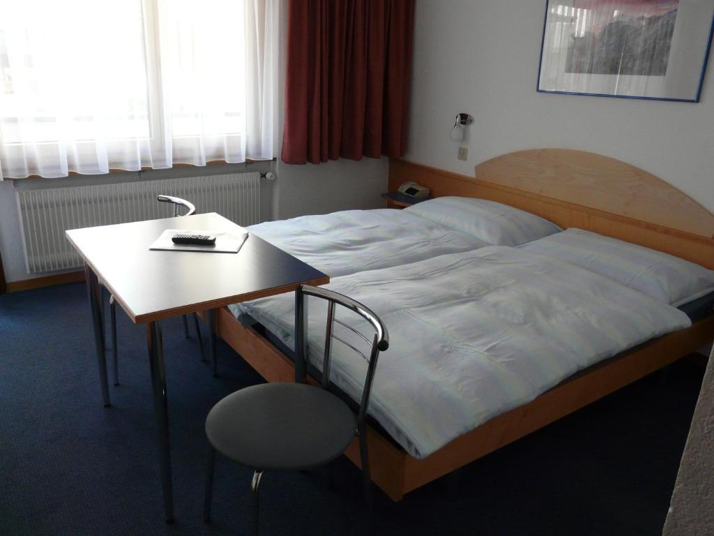 Hotel Garni Domino Saas Fee Quarto foto